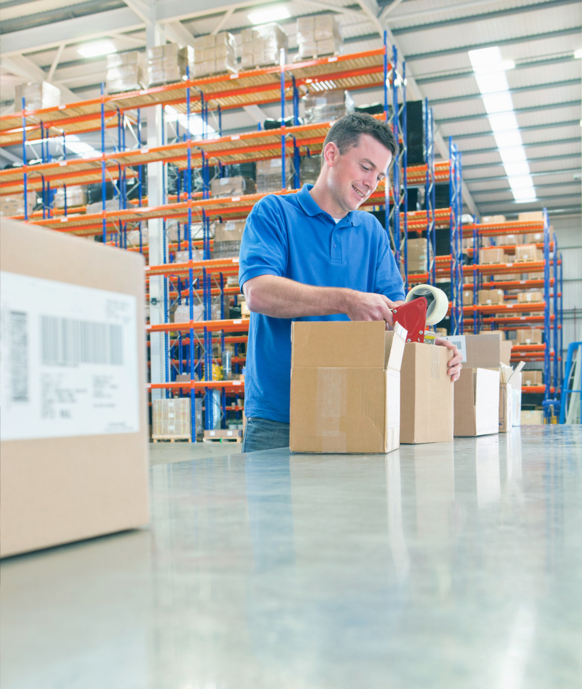 A warehouse employee preparing an order
