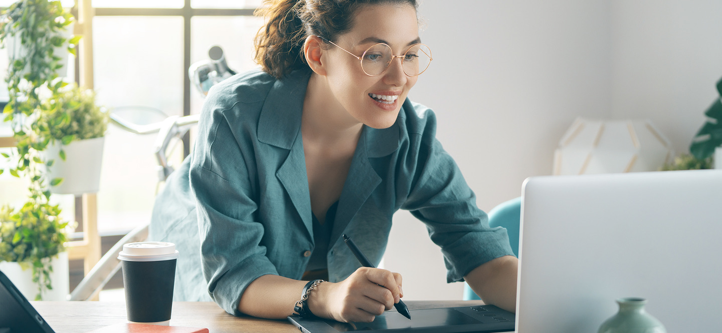 Woman working at a laptop
